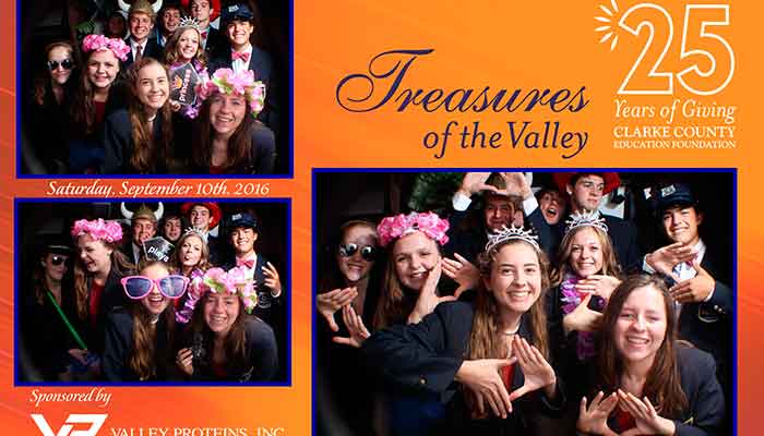 A group of people posing for pictures in front of an orange background.