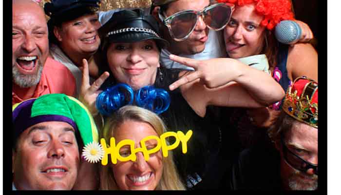 A group of people that are posing for the camera.