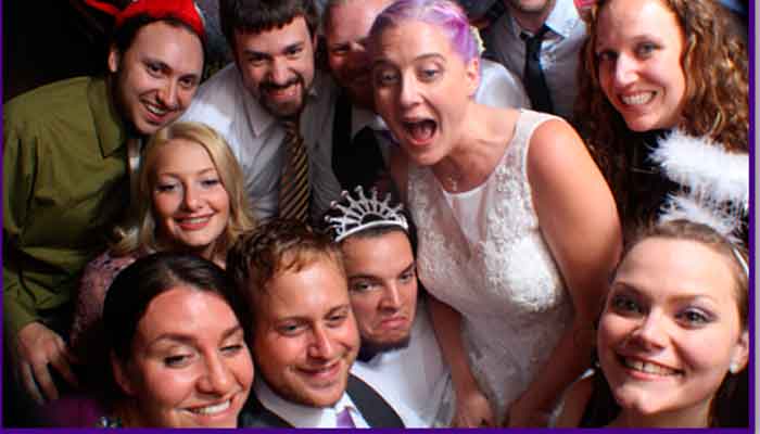 A group of people that are posing for the camera