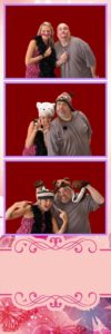 A couple of people that are in the photo booth