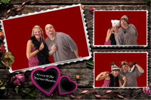 A couple taking pictures in a photo booth.