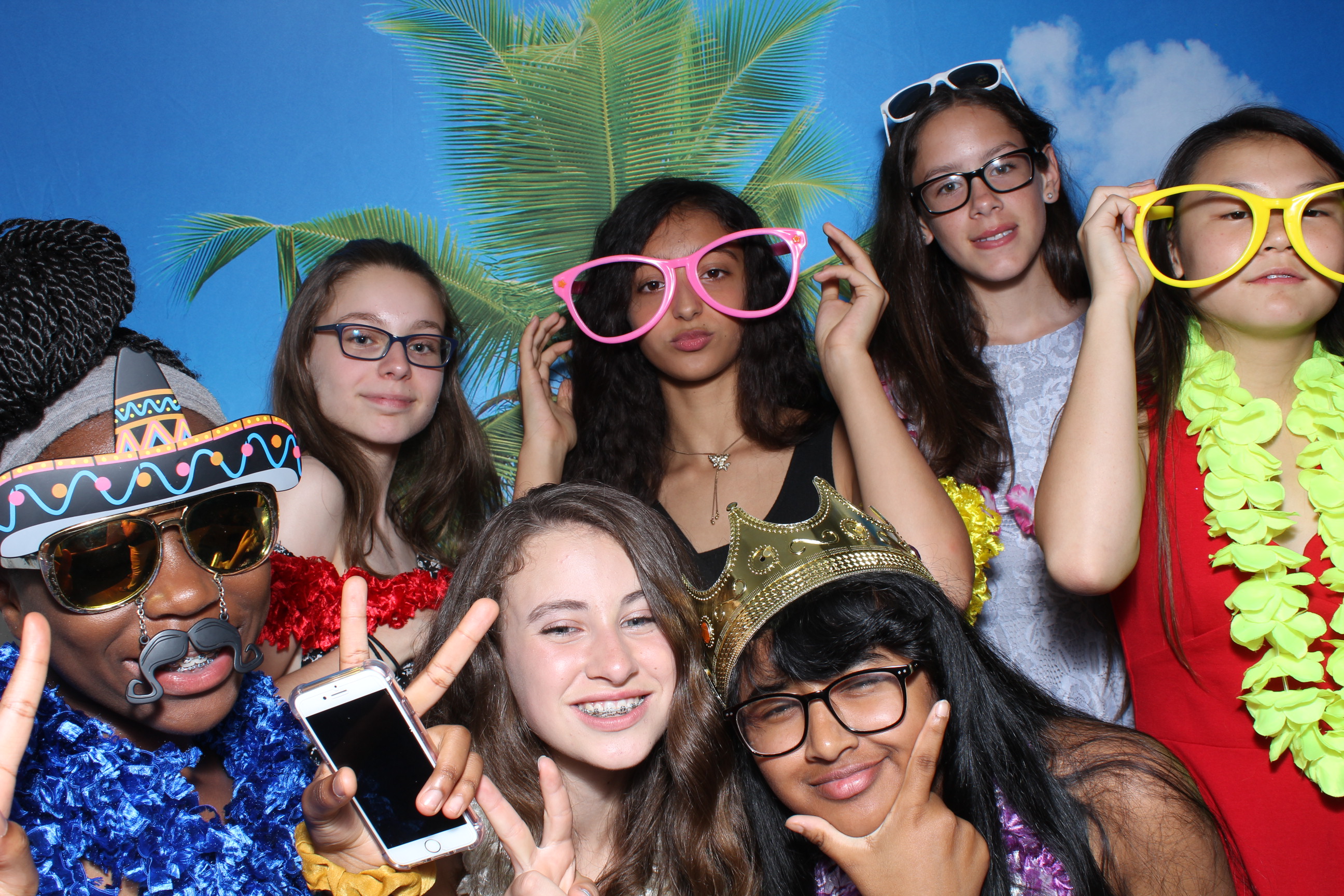 A group of girls posing for the camera.