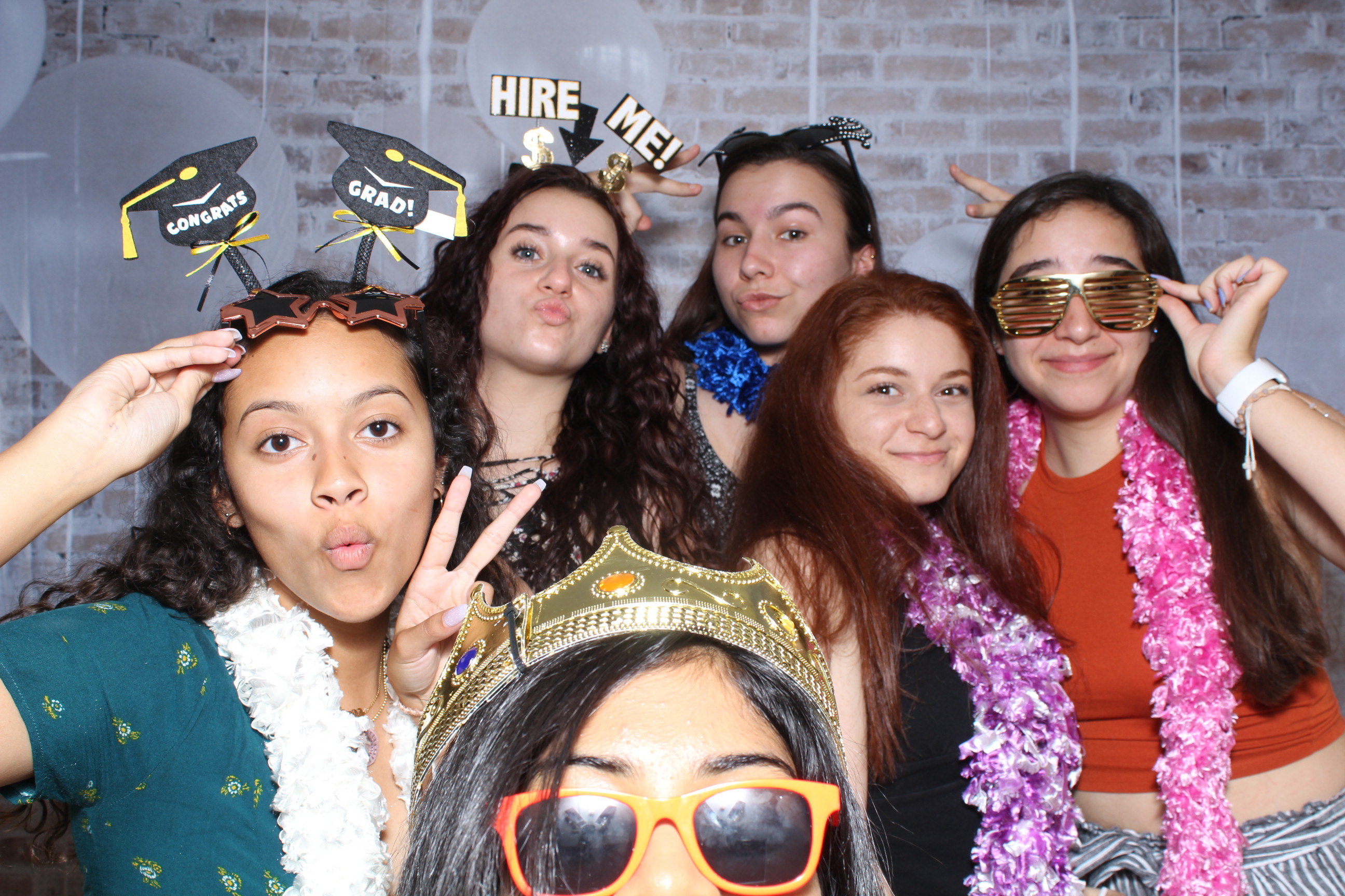 A group of people that are posing for the camera