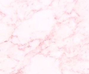 A pink marble background with white and black spots.