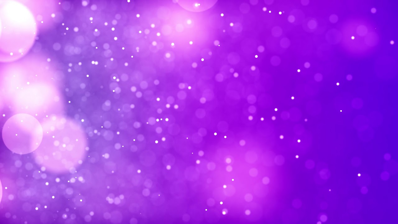 A purple background with some white lights on it